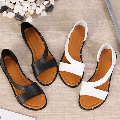 "Sandales orthopédiques de luxe pour femmes, cuir blanc et noir, design élégant et soutien confortable pour tous les jours."
