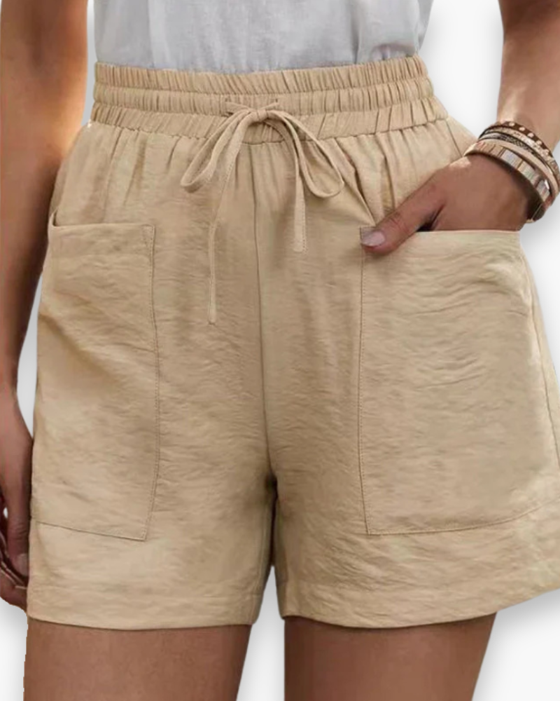 Short cargo femme été, tissu respirant léger, poches latérales, ceinture ajustable, confort et style décontracté.