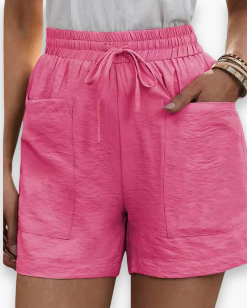 Short cargo femme été, tissu respirant léger, poches latérales, ceinture ajustable, confort et style décontracté.