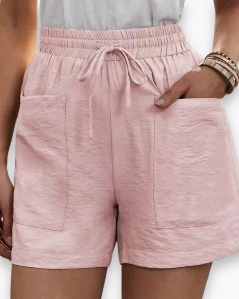 Short cargo femme été, tissu respirant léger, poches latérales, ceinture ajustable, confort et style décontracté.