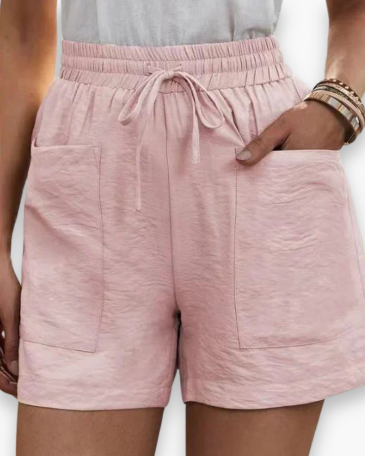 Short cargo femme été, tissu respirant léger, poches latérales, ceinture ajustable, confort et style décontracté.
