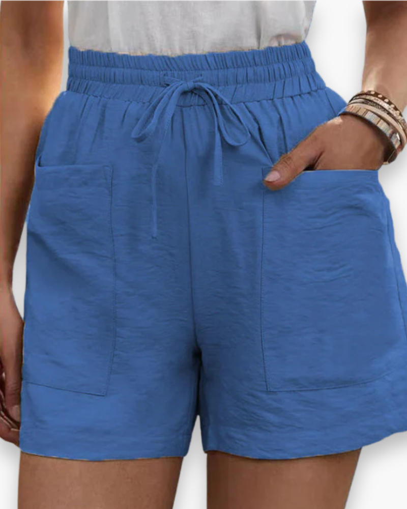 Short cargo femme été, tissu respirant léger, poches latérales, ceinture ajustable, confort et style décontracté.