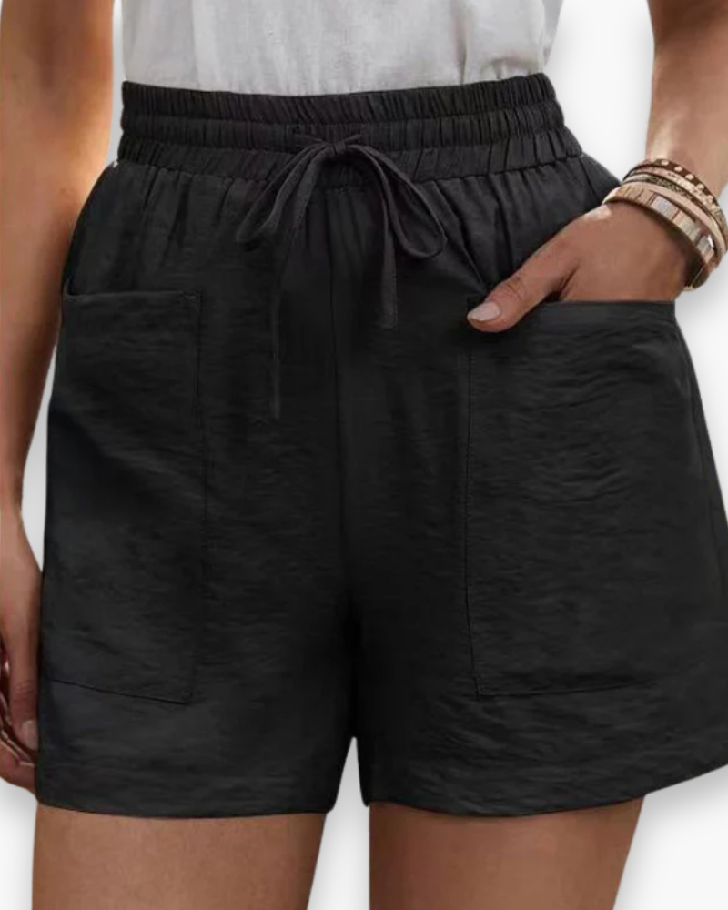 Short cargo femme été, tissu respirant léger, poches latérales, ceinture ajustable, confort et style décontracté.