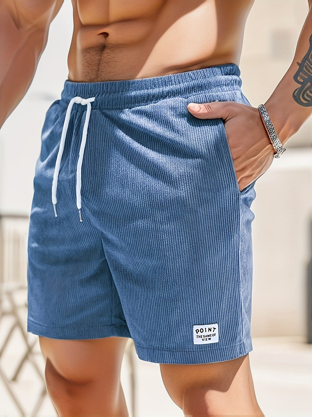 Short casual en corduroy homme, couleur beige, texture côtelée, design estival idéal pour les journées chaudes.