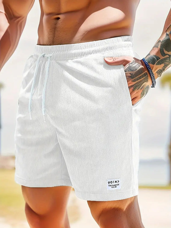 Short de bain homme coloré avec taille élastique et cordon, parfait pour la plage ou piscine, séchage rapide et élégant.