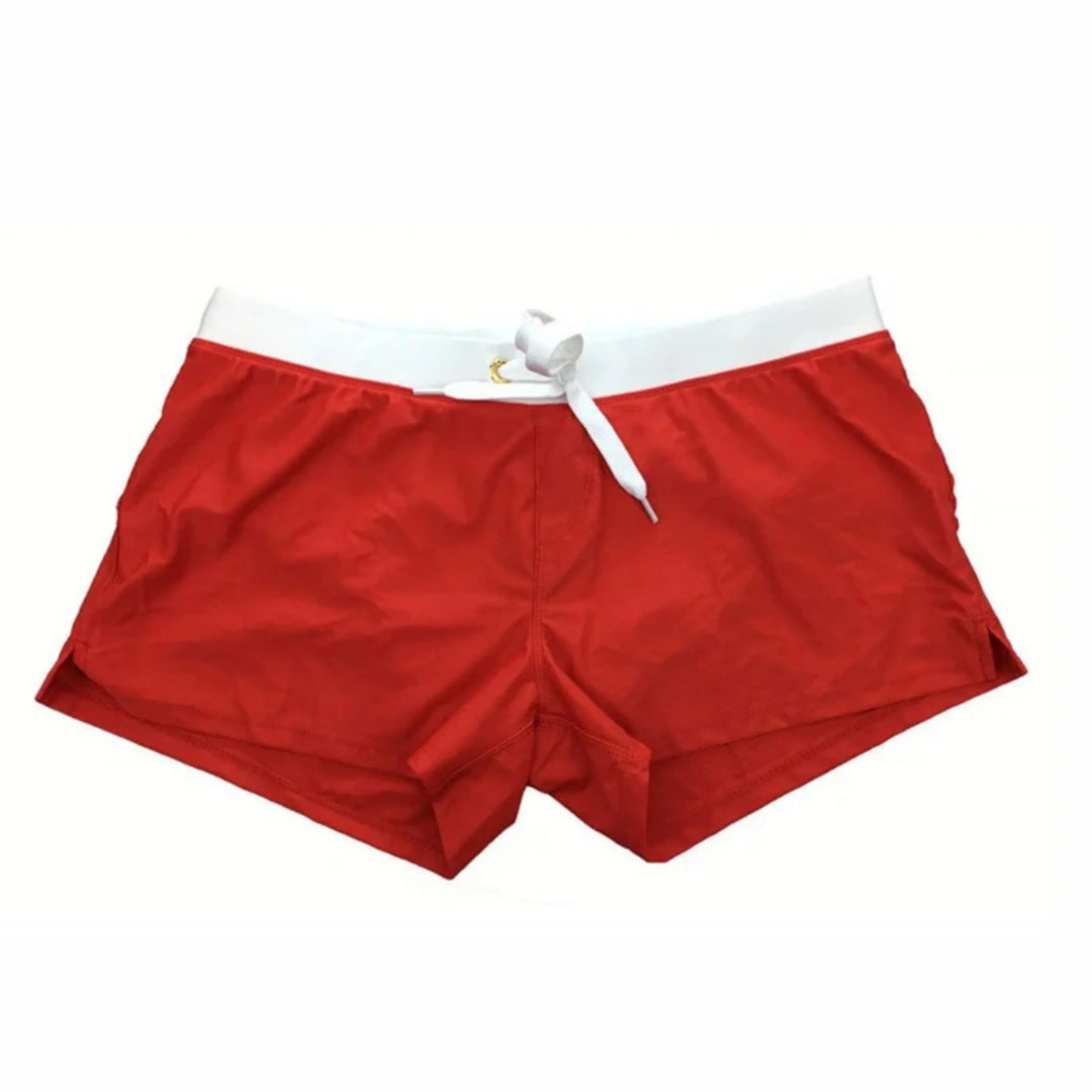 "Short de bain homme séchage rapide, léger, cordon serrage, bleu vif, idéal pour plage, piscine et sports nautiques."