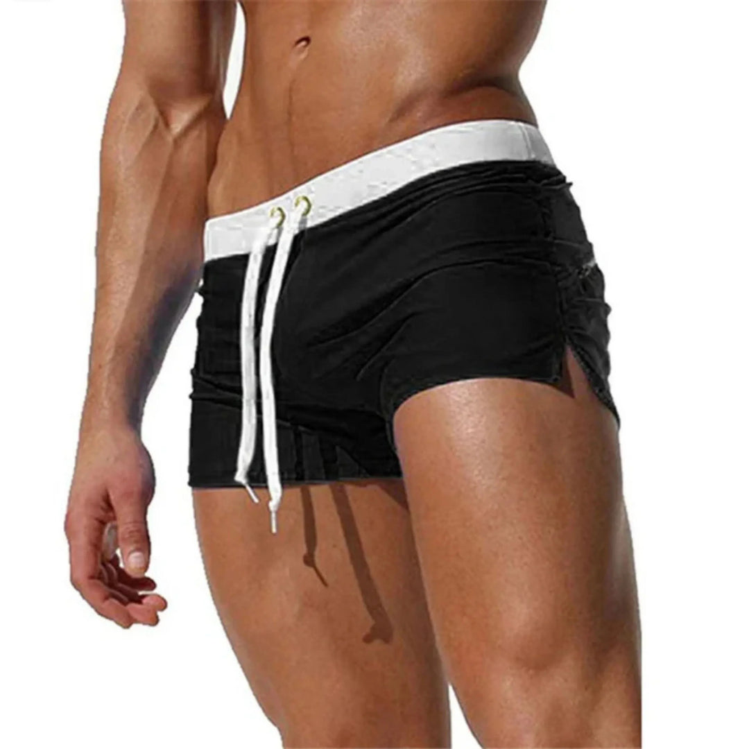 "Short de bain homme séchage rapide, léger, cordon serrage, bleu vif, idéal pour plage, piscine et sports nautiques."