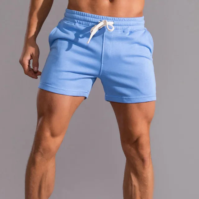 "Short homme Lucien en coton léger, style décontracté, avec poches latérales, idéal pour l'été."