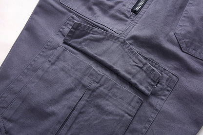 "Short tactique homme beige, style cargo, avec poches profondes et ceinture réglable, idéal pour activités extérieures."