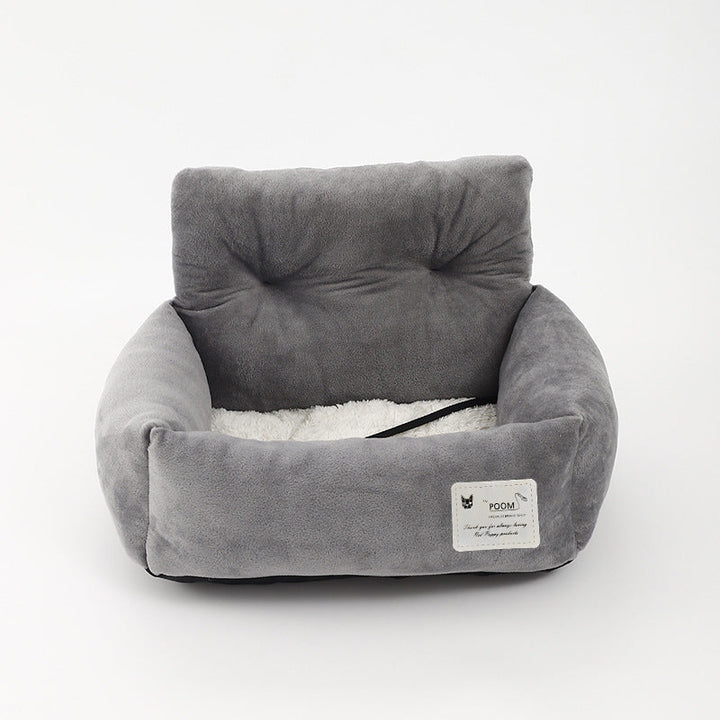 "Siège auto pour chien, tissu molletonné, harnais sécurisé, coussin lavable pour voyage confortable et sûr."