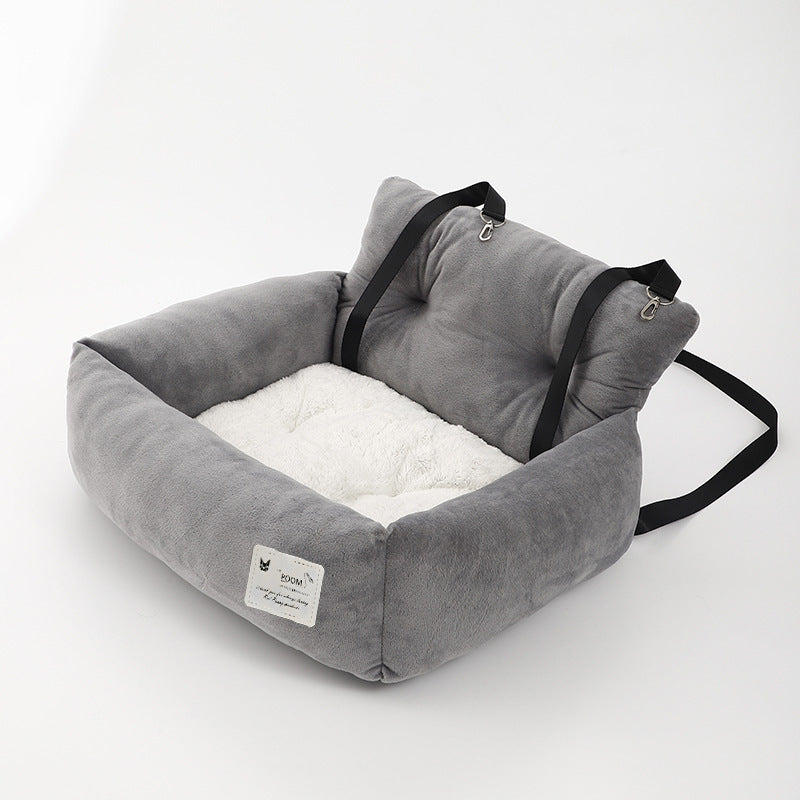"Siège auto pour chien, tissu molletonné, harnais sécurisé, coussin lavable pour voyage confortable et sûr."