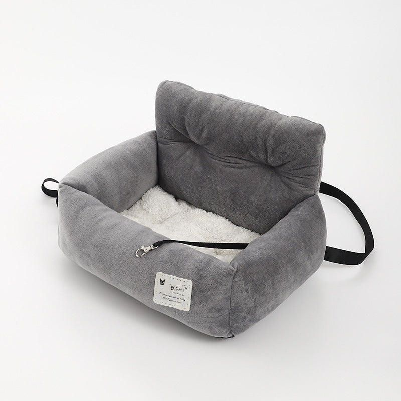 "Siège auto pour chien, tissu molletonné, harnais sécurisé, coussin lavable pour voyage confortable et sûr."