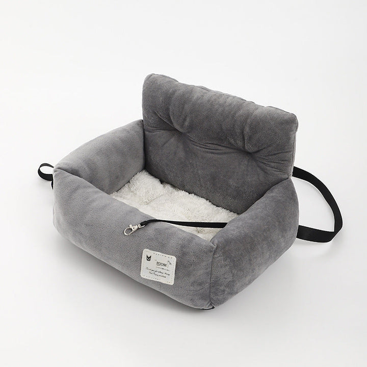 "Siège auto pour chien, tissu molletonné, harnais sécurisé, coussin lavable pour voyage confortable et sûr."