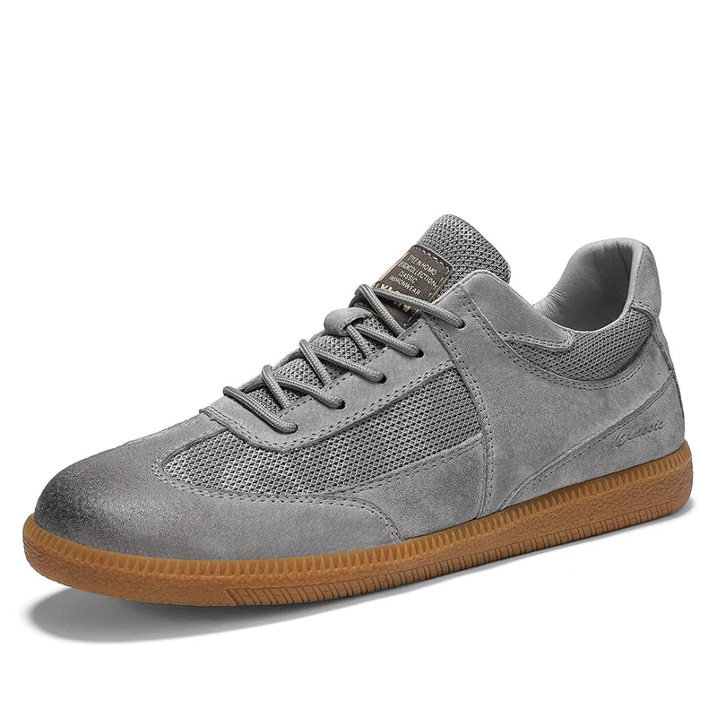 Sneakers en cuir italien pour homme, design élégant noir, semelle antidérapante, confort et style premium.