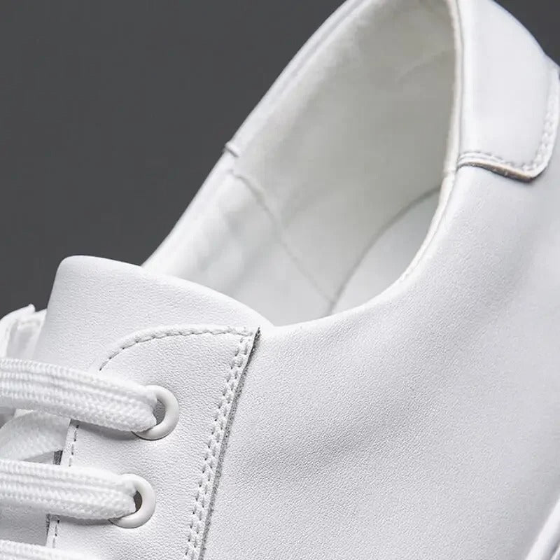"Sneakers en cuir véritable pour homme, confort exceptionnel et style moderne, semelle ergonomique, couleur classique."