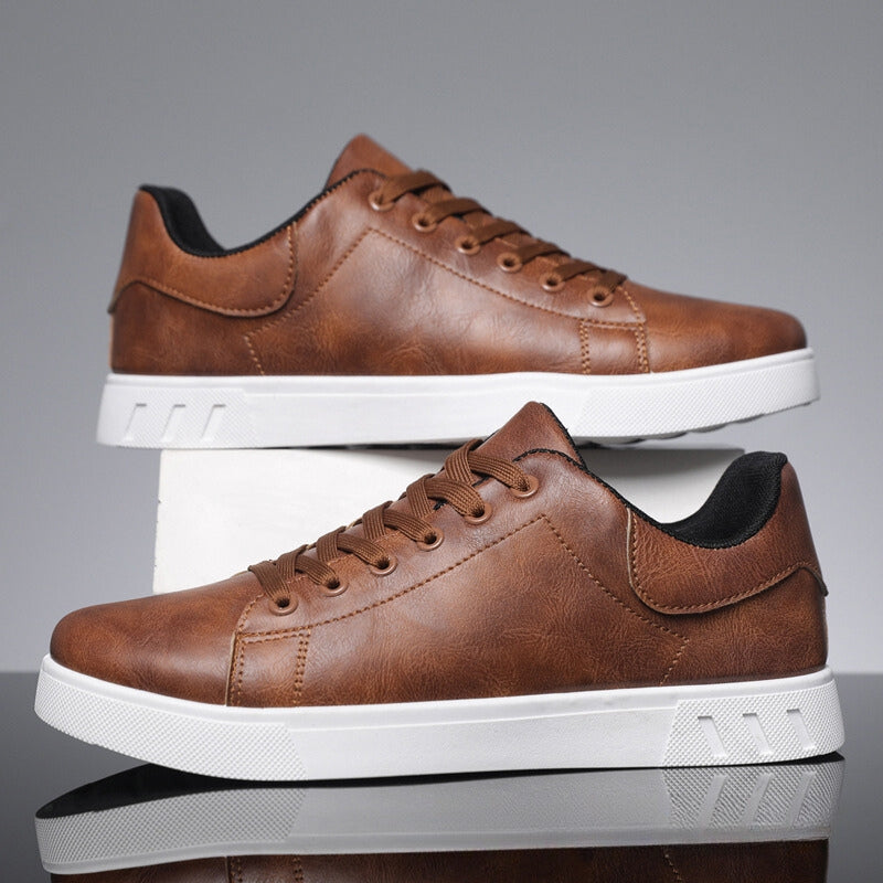 Sneakers homme élégantes et confortables, design minimaliste, couleur sobre, matériaux haute qualité, semelle antidérapante.