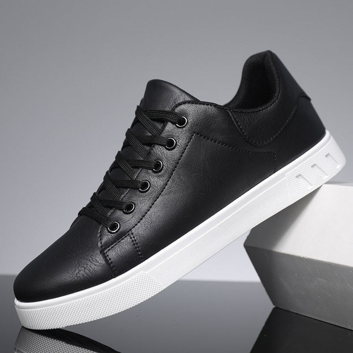 Sneakers homme élégantes et confortables, design minimaliste, couleur sobre, matériaux haute qualité, semelle antidérapante.