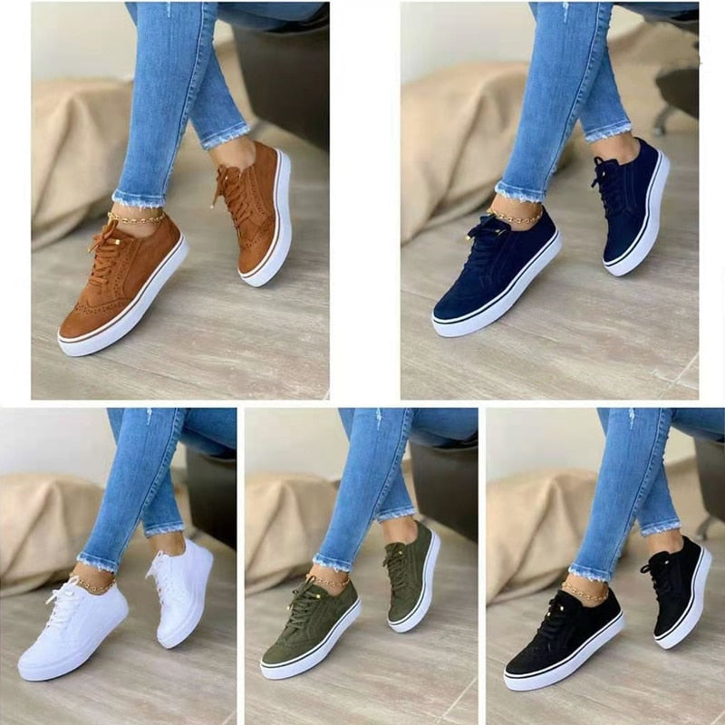 Sneakers orthopédiques élégantes pour femme en cuir blanc, avec semelle de soutien confortable et design moderne.
