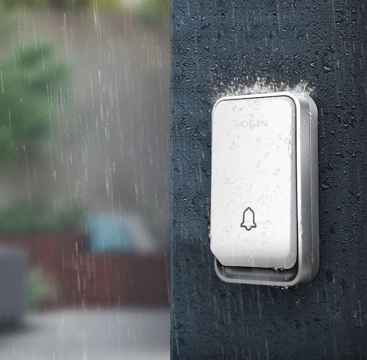 "Sonnette sans fil écologique sans batterie, installée près d'une porte, étanche et durable, avec indicateur LED."