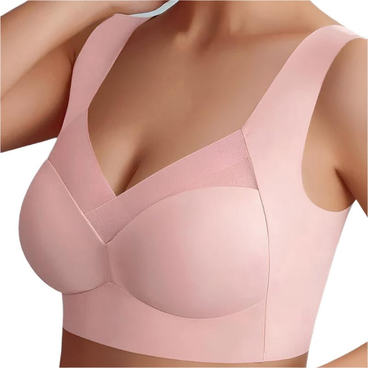 Soutien-gorge sans couture, beige, confortable, épousant la silhouette, idéal sous vêtements moulants, matière douce.