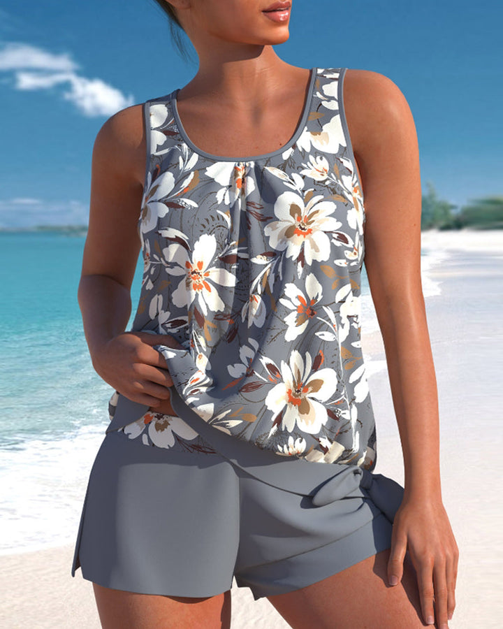 "Tankini femme Julia à coques rembourrées et fronces flatteuses, vue en action. Confort et style pour activités aquatiques."