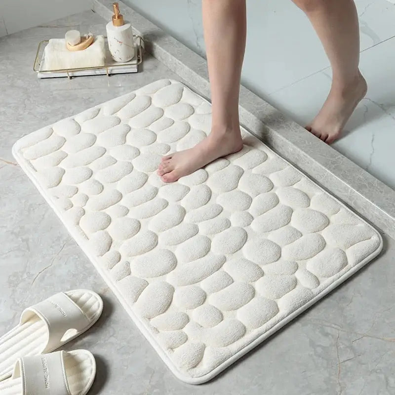 "Tapis de bain anti-dérapant GaletConfort, design galets, blanc, confort moelleux et ultra-absorbant, 40x60 cm."