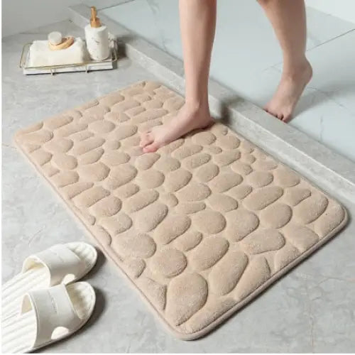 "Tapis de bain anti-dérapant GaletConfort, design galets, blanc, confort moelleux et ultra-absorbant, 40x60 cm."