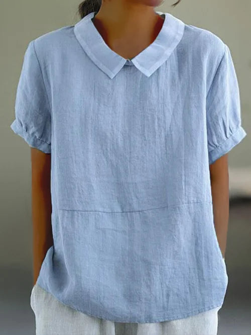 "Top en coton lin uni, léger et épuré, pour femme. Confort respirant, coupe élégante pour un look décontracté chic."