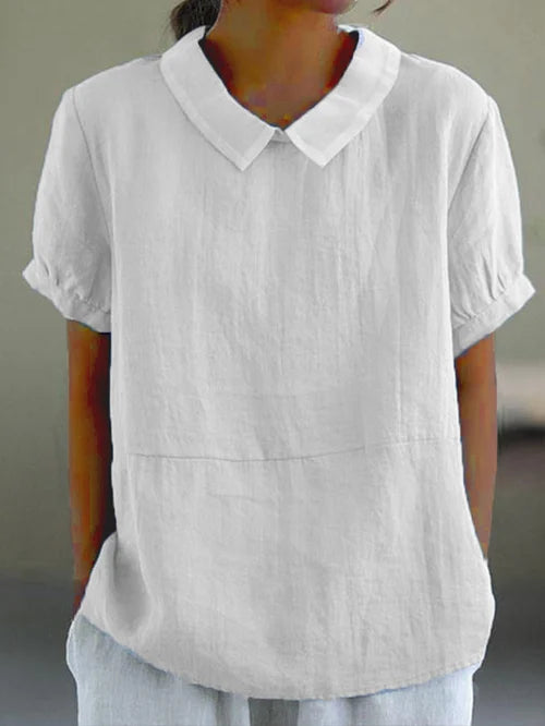 "Top en coton lin uni, léger et épuré, pour femme. Confort respirant, coupe élégante pour un look décontracté chic."