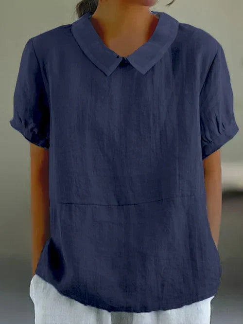 "Top en coton lin uni, léger et épuré, pour femme. Confort respirant, coupe élégante pour un look décontracté chic."