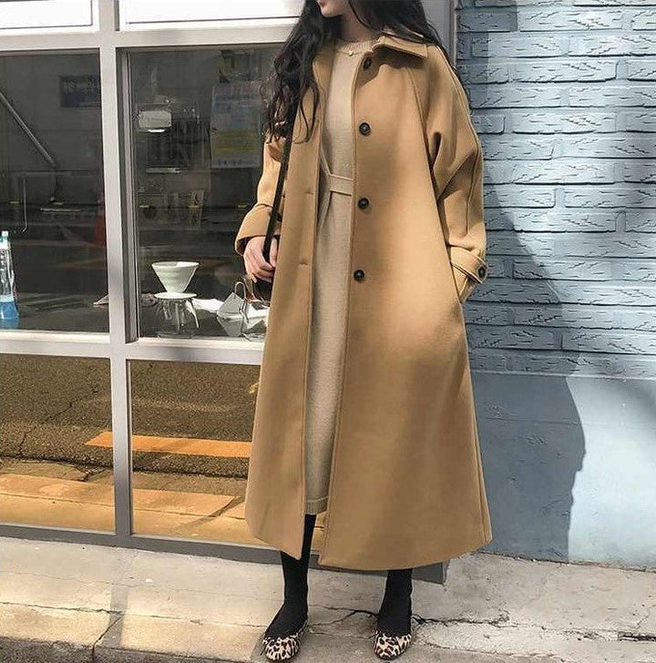 Trench-coat ceinturé en laine bleu marine pour femme, élégant et chaud pour l'automne hiver, accentue la silhouette.