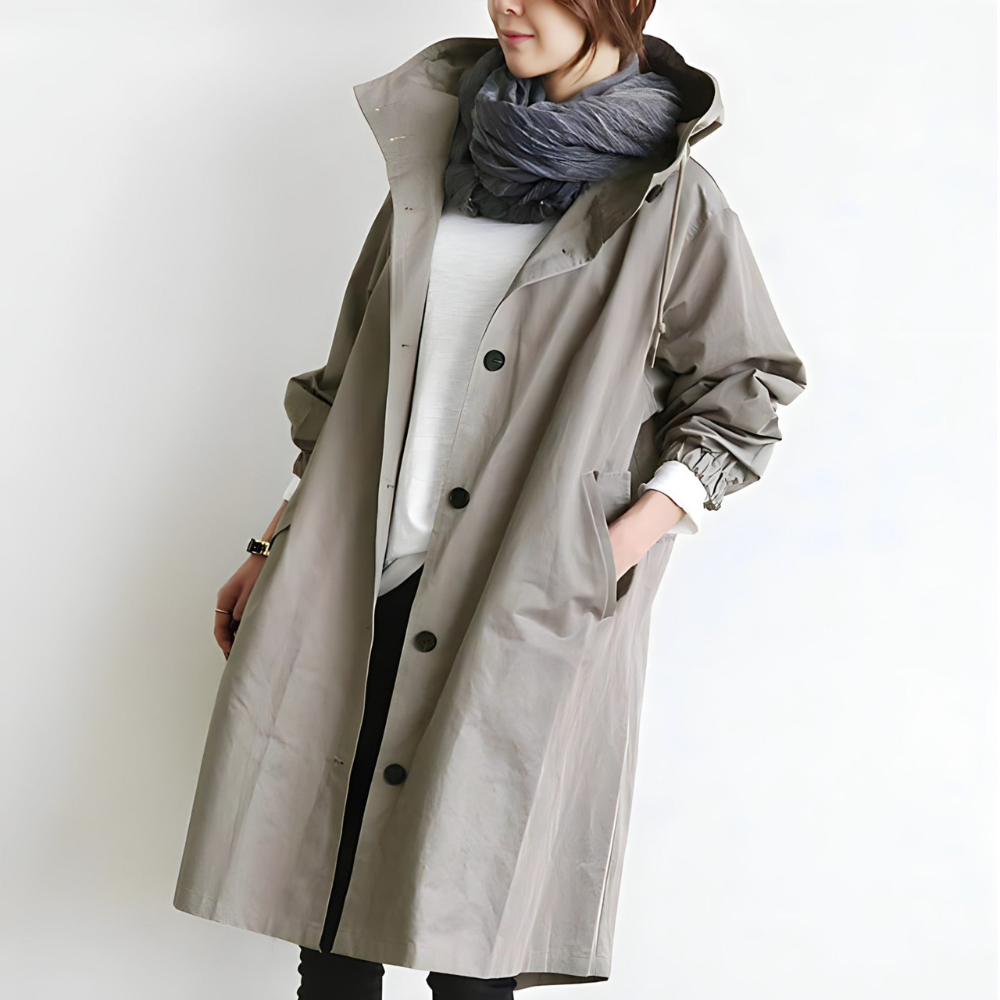 Trench-coat femme élégant vert armée, vue de face, chic et confortable pour toutes saisons, style intemporel adaptable.