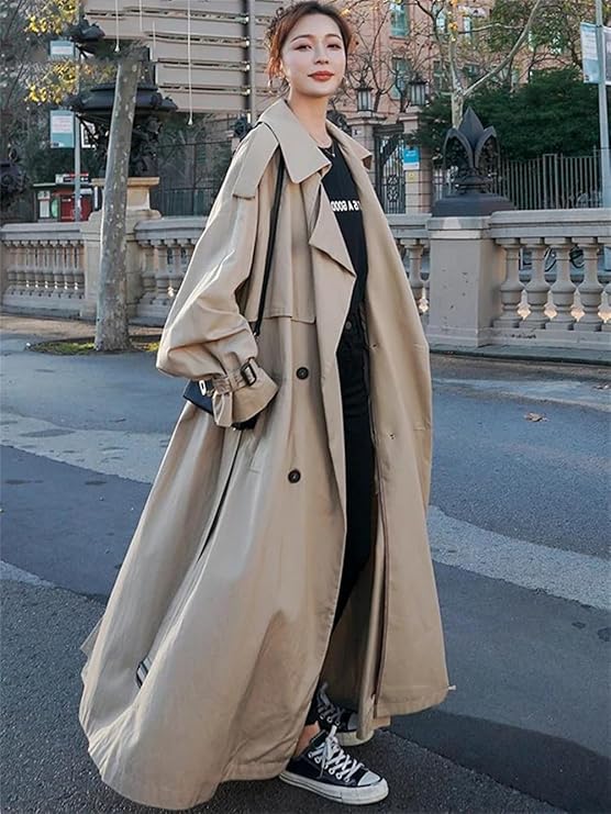 "Trench-coat long oversize pour femmes, style élégant, tissu beige de haute qualité, look sophistiqué et confortable."
