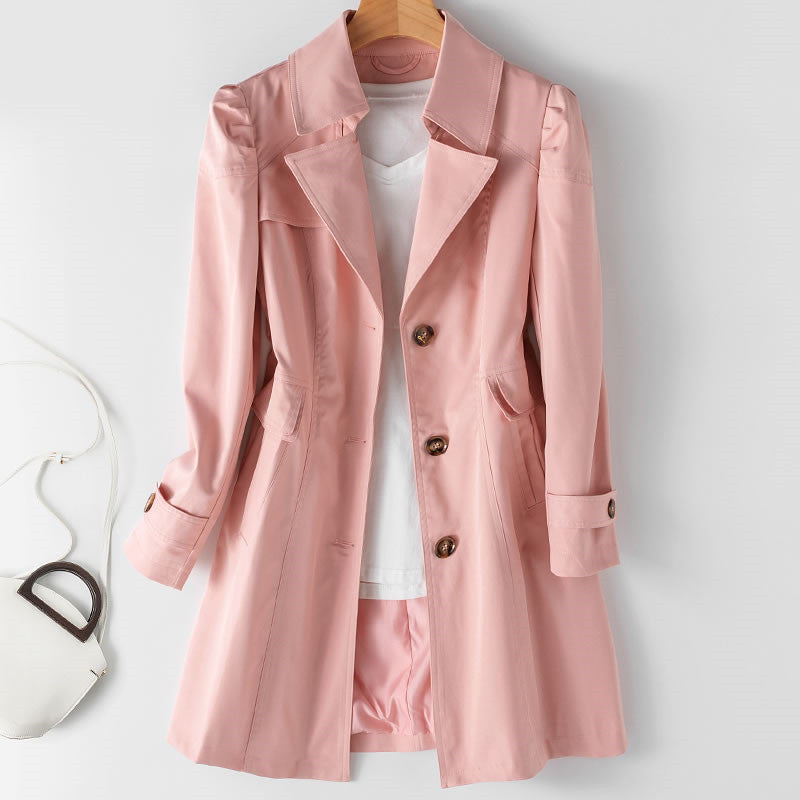 "Trench mi-long élégant pour femme, vue de face, disponible en couleurs classiques noir, blanc, rose, et beige."
