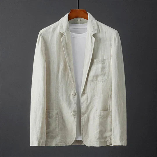 "Veste blazer homme moderne en laine mélangée, coupe ajustée, poches passepoilées et revers cranté."