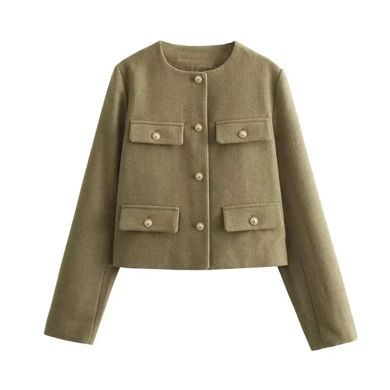 "Veste cintrée femme élégante, boutons dorés, tissu luxueux et coupe flatteuse, idéale pour des looks chics."