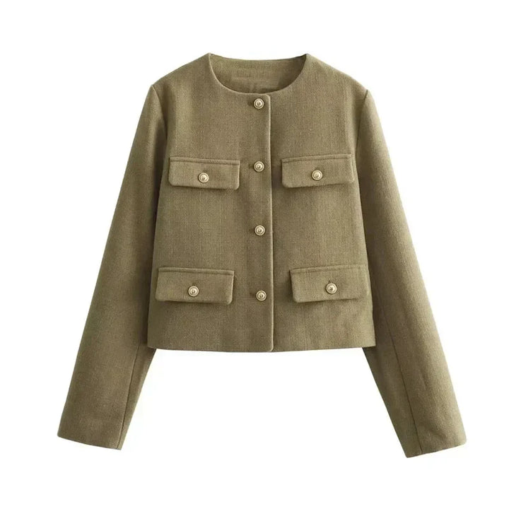 "Veste cintrée femme élégante, boutons dorés, tissu luxueux et coupe flatteuse, idéale pour des looks chics."