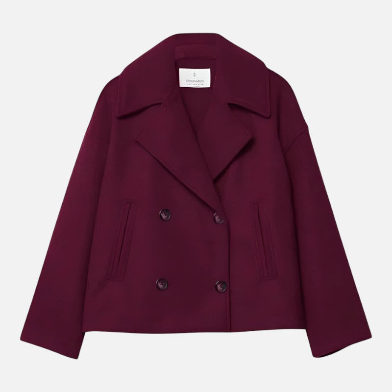 Veste cintrée minimaliste pour femme, élégante, coupe chic, double boutonnage, tissu fluide, revers larges, moderne.