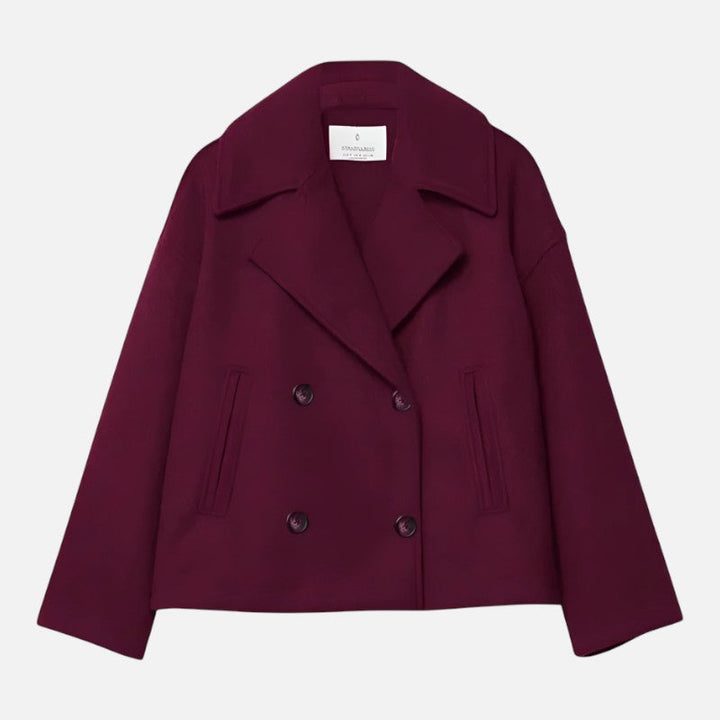 Veste cintrée minimaliste pour femme, élégante, coupe chic, double boutonnage, tissu fluide, revers larges, moderne.