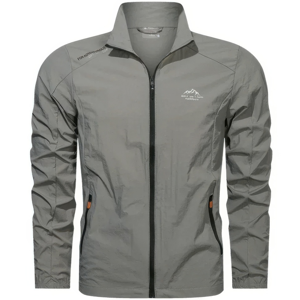 "Veste d'été coupe-vent homme légère, anti-UV, bleue avec poches zippées, idéale pour randonnée et plein air."