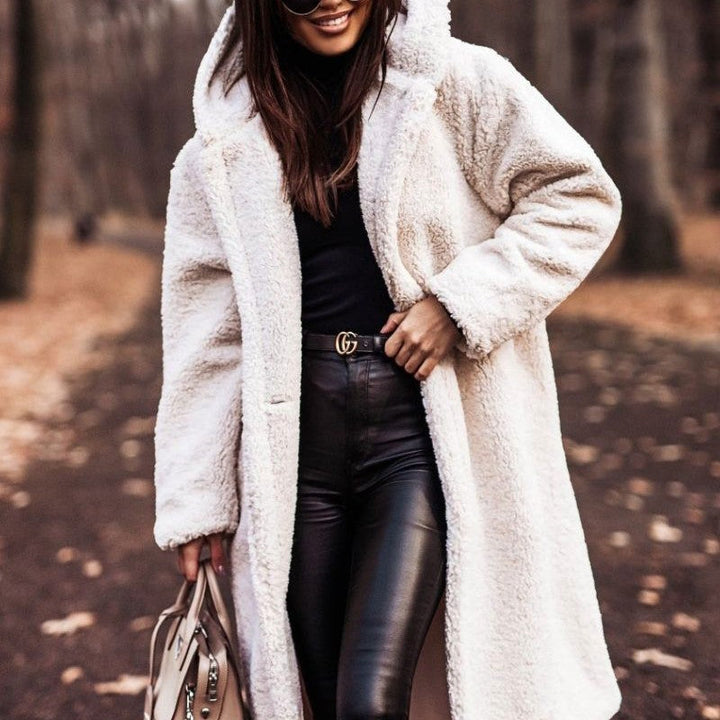 "Veste d'hiver élégante pour femme, beige, design intemporel, confort optimal, doublure douce, parfaite pour le froid."