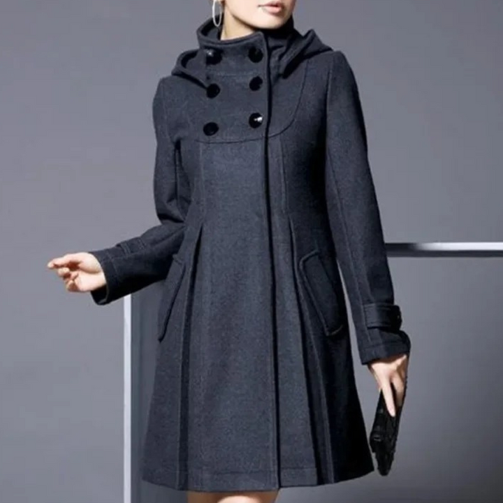 "Veste d'hiver femme élégante vert foncé avec poches latérales, coupe moderne, style sophistiqué pour occasions variées."