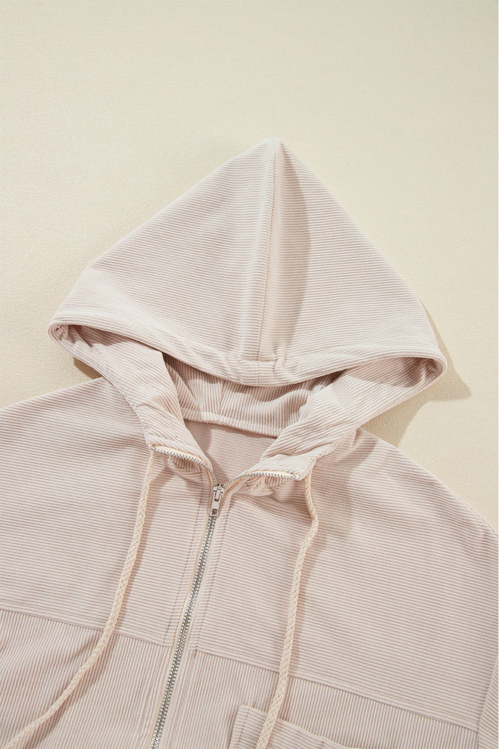 "Veste en velours côtelé beige avec capuche, style décontracté et élégant pour femmes, doux et parfait pour l'automne."
