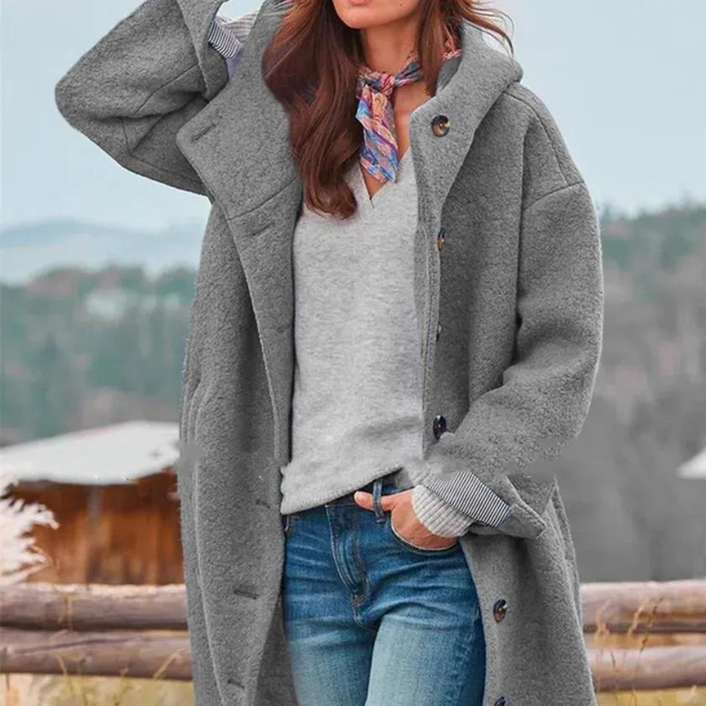 "Veste épaisse pour femmes, vue de face, coupe moderne, tissu tweed gris, élégante et chaude, idéale pour l'hiver."
