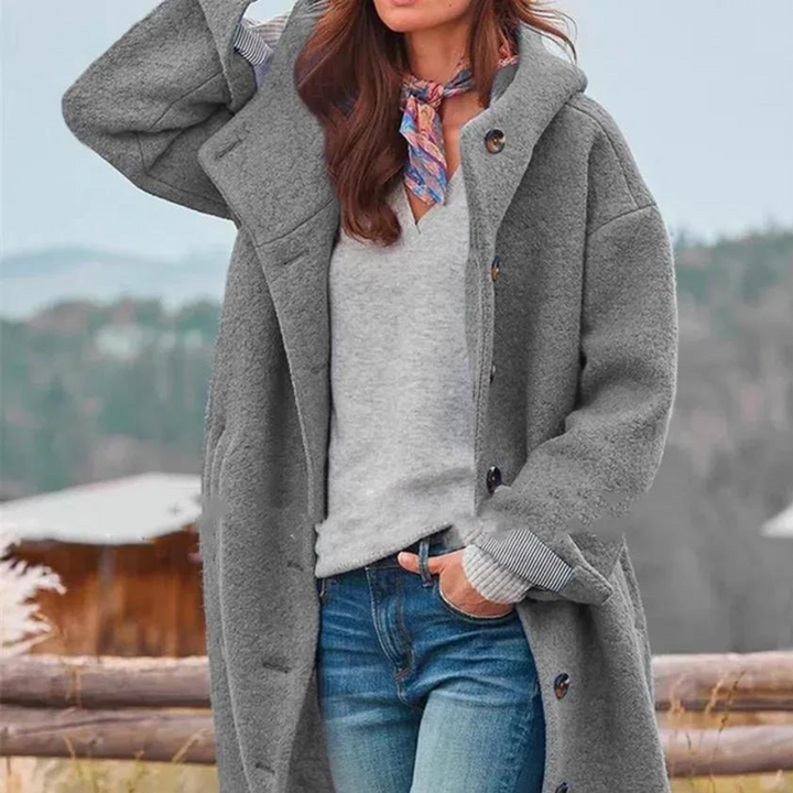 "Veste épaisse pour femmes, vue de face, coupe moderne, tissu tweed gris, élégante et chaude, idéale pour l'hiver."