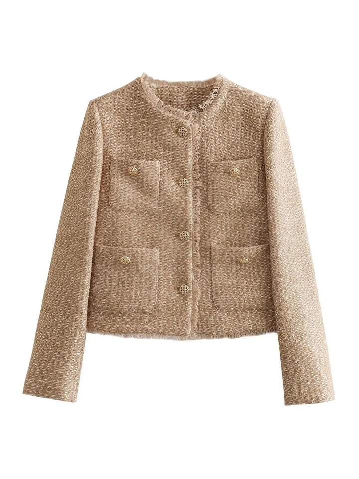 Veste femme chic, coupe élégante, coloris neutre, boutons devant, style moderne, adaptée mi-saison et usage quotidien.