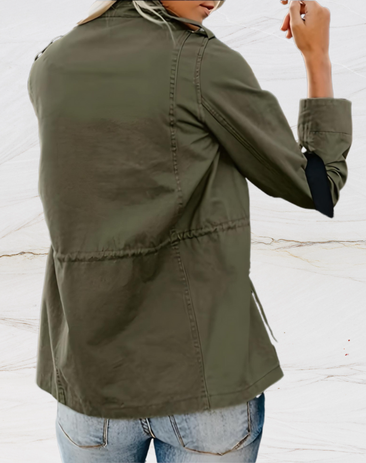 "Veste femme élégante Nora, manches longues, quatre poches, design chic et pratique, couleur noire, style contemporain."