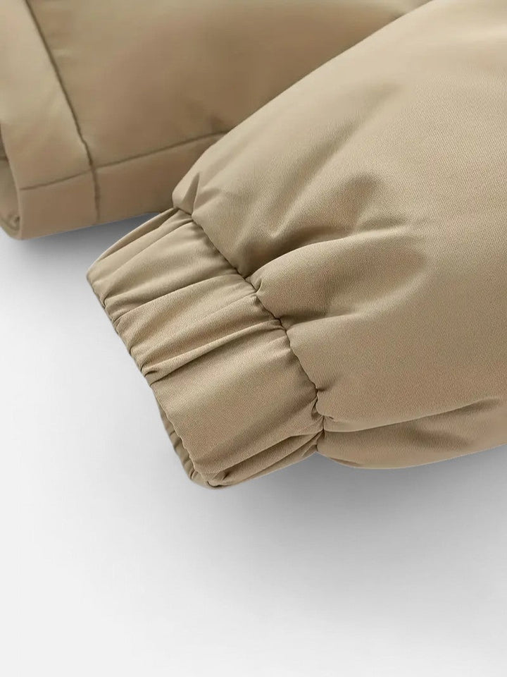 Veste hiver unisexe, blocs colorés, matelassée, capuche amovible, moderne, idéale pour hommes et femmes, style tendance.
