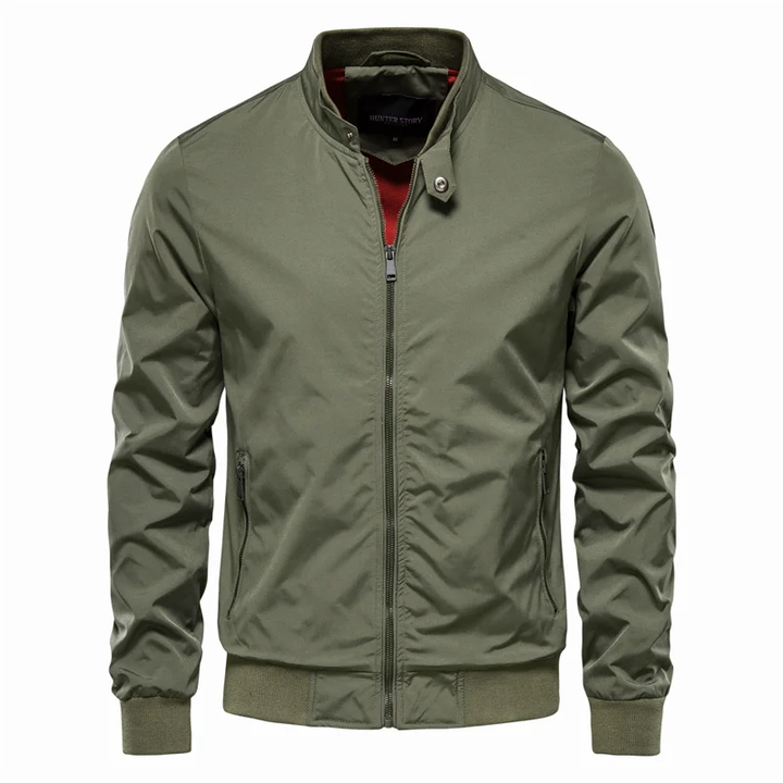 "Veste homme printemps légère chic, design moderne, tissu respirant, poches fonctionnelles, couleur grise élégante."