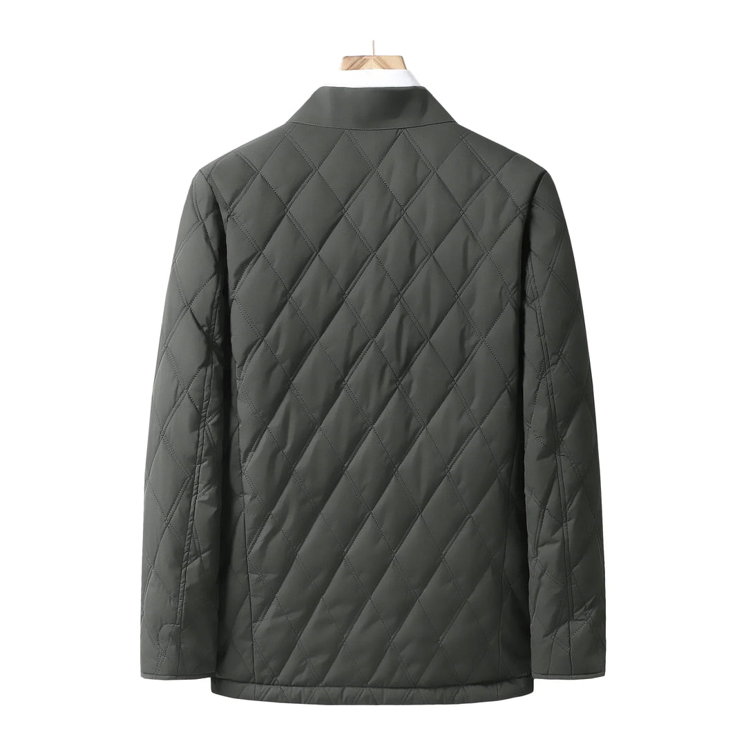 "Veste imperméable homme, matelassée chic, coupe intemporelle, couleur sombre, pour transition saison froide"